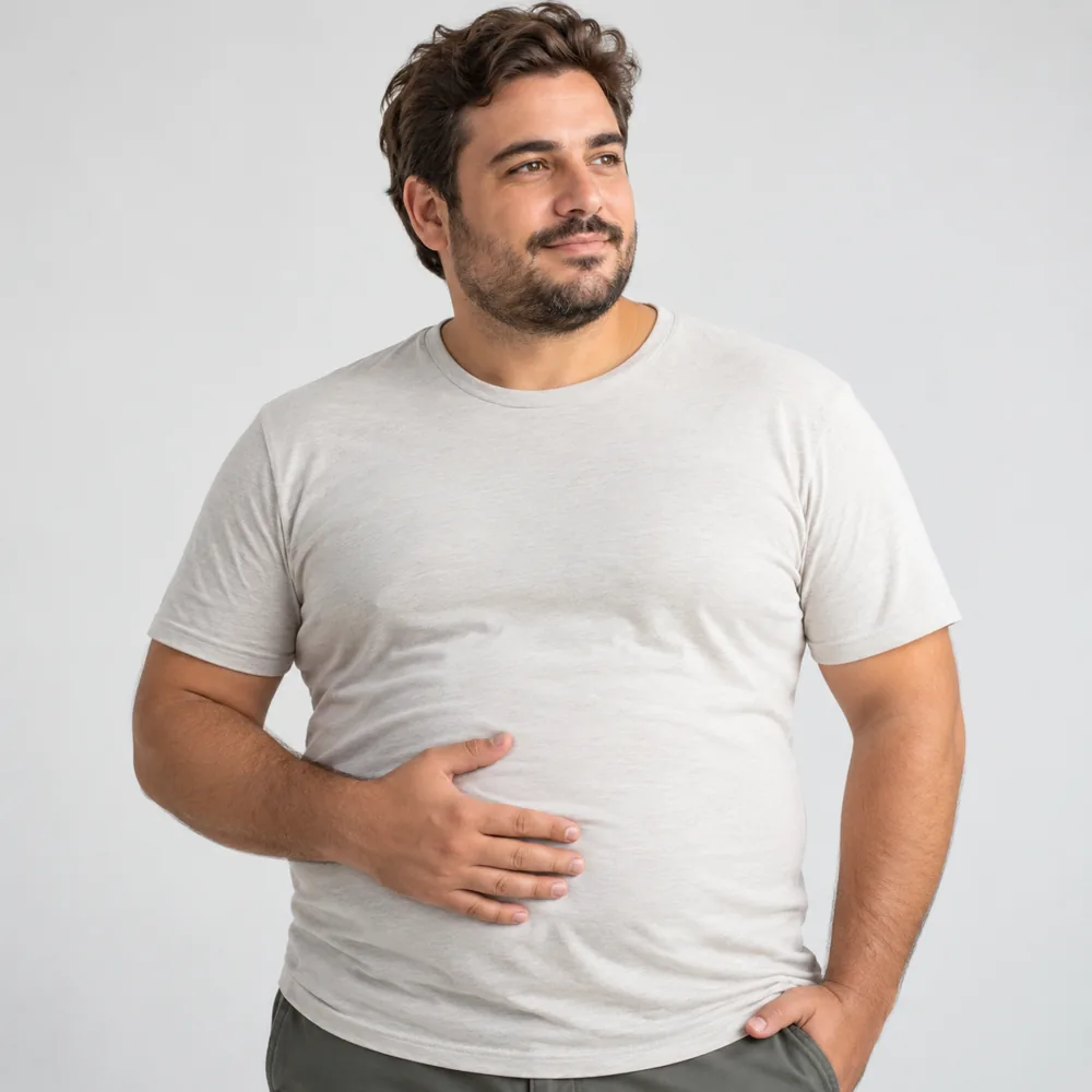 Detalle del abdomen de un hombre adulto para ilustrar el control del peso